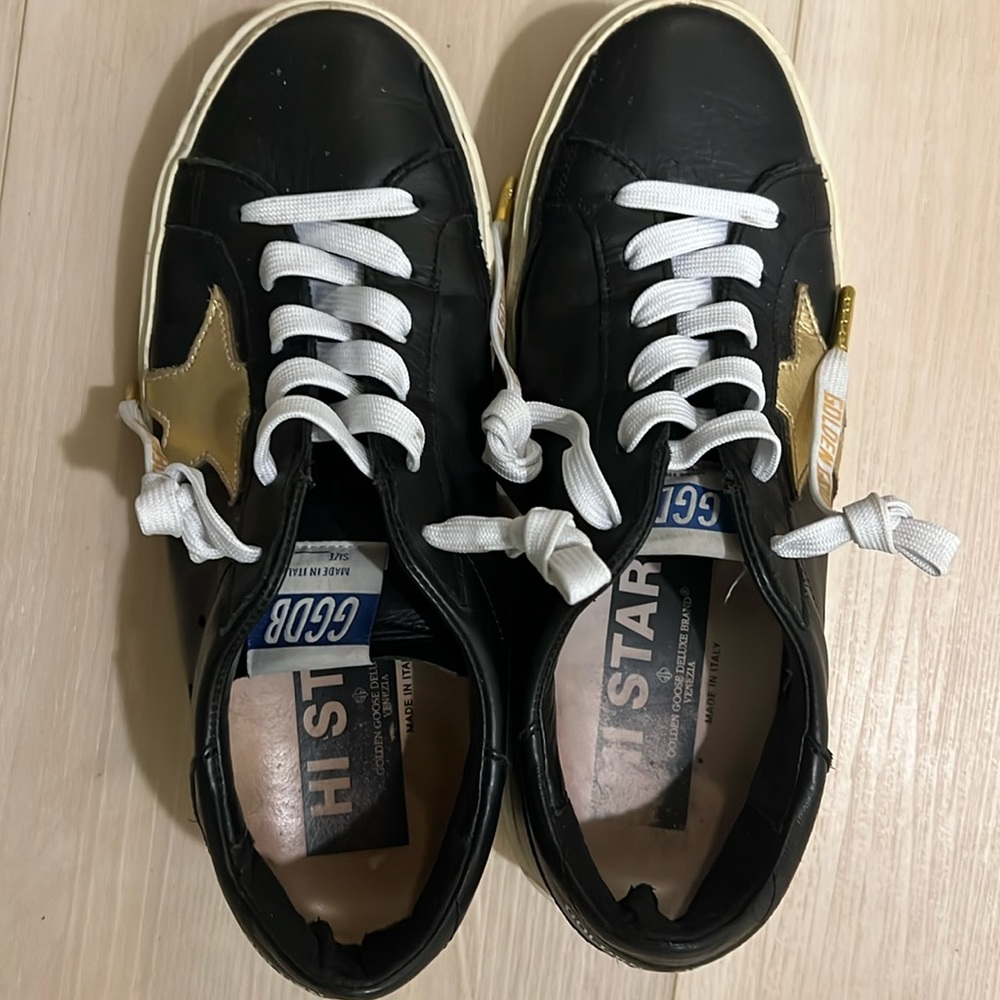 Pre-loved Golden Goose HI STAR black leather sneakers, gold stars, US 7, 37